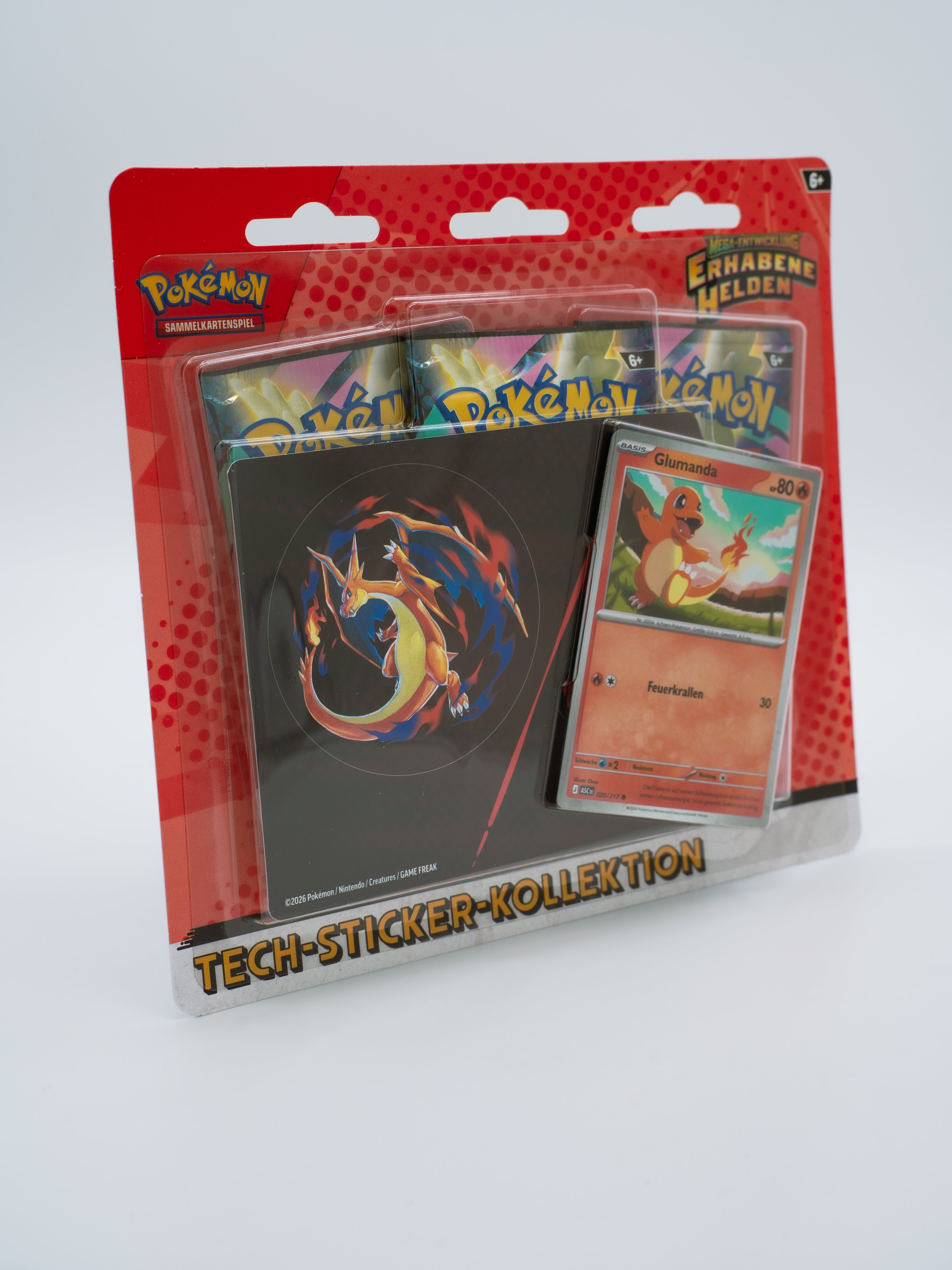 Pokémon Tech-Sticker-Kollektion „Mega-Entwicklung – Erhabene Helden: Glumanda“ (DE)